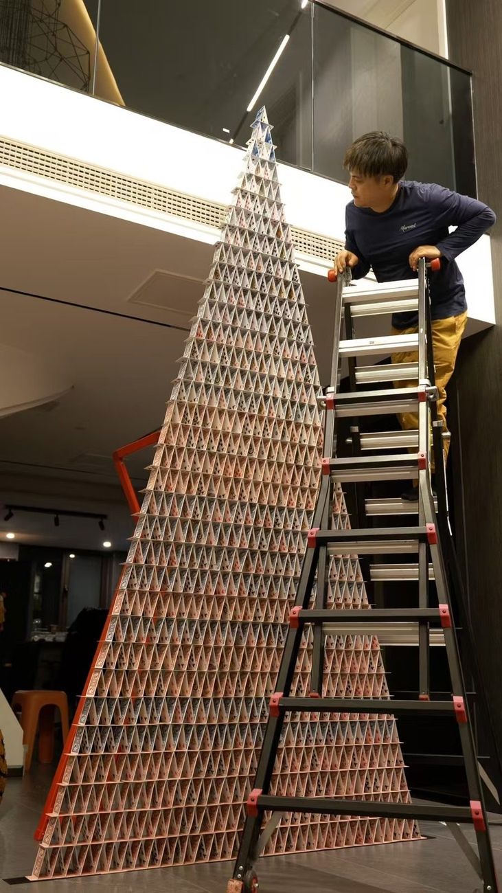 Live build in progress — builder on a ladder
